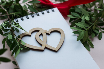 wooden heart on a white background, space for text