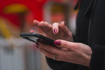 Female hands and phone close up