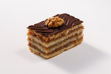 Layered cake with chocolate, walnut and apricot jam, called Zserbo