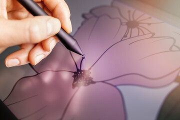 Fototapeta vector art - closeup of hand with digital pen drawing flower illustration on graphics tablet obraz
