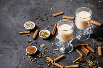 Masala chai served with cinnamon sticks and anise