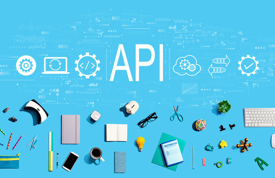 API - application programming interface concept with collection of electronic gadgets and office supplies