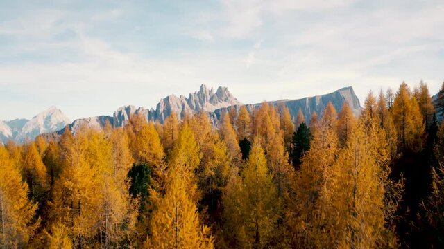  aerial view of the spectacular Italian Dolomites on a sunny autumn afternoon. 