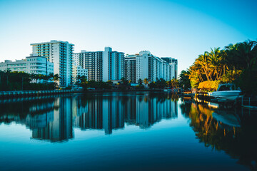 view of the city reflections aquatic palm tropical beach florida house traveling pool sky architecture station hotel vacation sea summer blue tree luxury shore island tourism buildings 