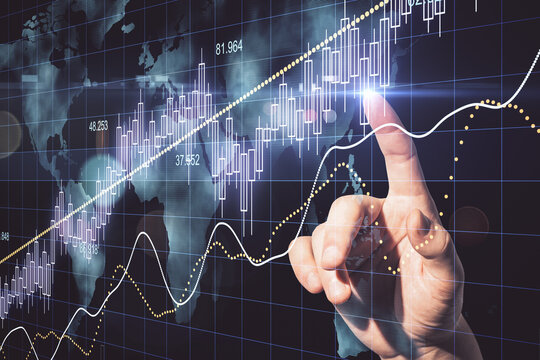 Hand using candlestick chart with digital world map hologram - Powered by Adobe