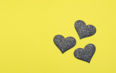 Gray silver heart for valentine's day isolated on yellow background. Panton 2021. Glitter and sparkle hearts. Expensive ornate banner. Valentine's day background