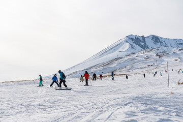 People skiing on the ski slope. Kayseri, Panoramic view of Erciyes,Turkey.