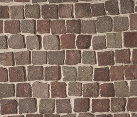 Pavement texture.Old granite stone pavement In the park.Top view