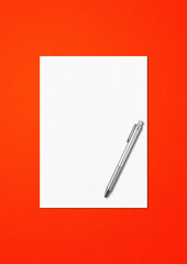 Blank White A4 paper sheet and pen mockup template on red background