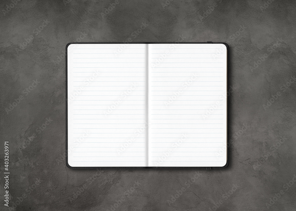 Poster Black open lined notebook isolated on dark concrete background