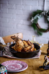 ROAST CHICKEN WITH potatoes.