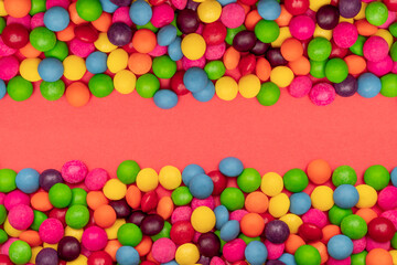 Fototapeta na wymiar Frame of multi-colored candies close up