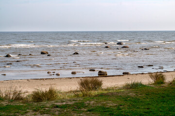 Large stone boulders on the shore of the Gulf of Riga.