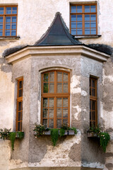 Fototapeta na wymiar A protruding bay window on the wall of the medieval Dundaga castle in Latvia.
