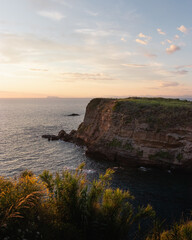 Cliff over the sea at sunset