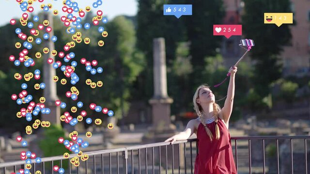 globalization, media-young woman takes a selfie - overlay emoji