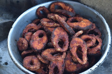cooking deep frying of crispy tasty fish sea food in hot pan with low oil for diet cholesterol control dish by south indian tamilnadu homemade chettinad style