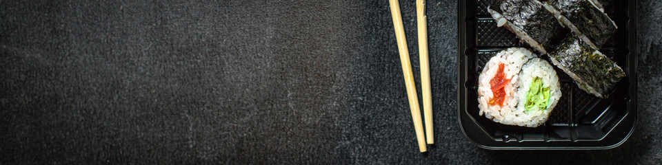 sushi rolls set salmon, rice, nori wakame tobiko caviar fresh snack on the table meal snack ingredient top view copy space for text food background rustic image