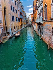 Obraz na płótnie Canvas Venetian streets-canals and gondolas