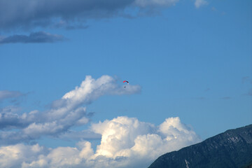 paraglider,sport,fun,freedom,clouds, nature, white,outdoors,mountain,air,fly,cloudy, clear, space,