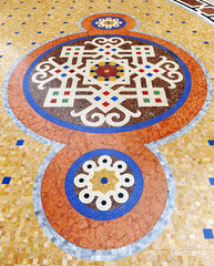 Mosaic pavement with shields in the Galleria Vittorio Emanuele II in Milan, Italy