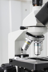 revolver system of biological microscope lenses in the laboratory