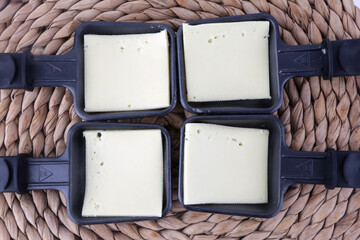 raclette tools to heat swiss alps cheese