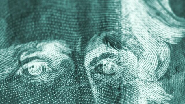 Flashing images of US Currency, twenty dollar bills in x-ray style.