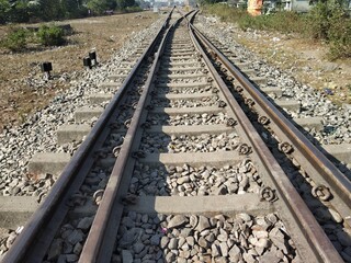 Indian railway track selectively focused.