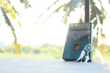 Kalimba or mbira is an African musical instrument.Traditional small Kalimba made from  wooden board...