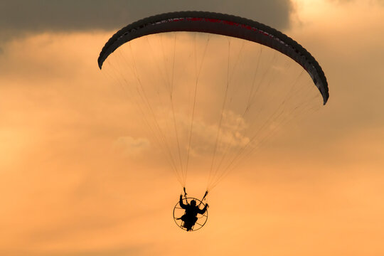 Paragliding at sunset 