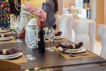 Red wine with wine glasses on the table at home.