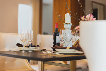 Red wine with wine glasses on the table at home.