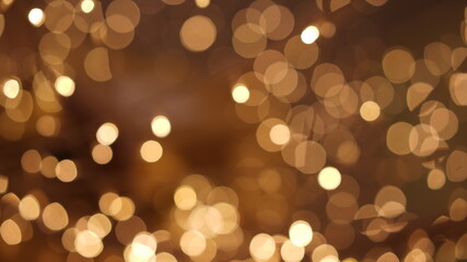 Bokeh of glowing light in the dark. Glittering bright flare luxury lantern light for celebration.