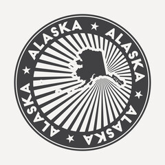 Alaska round logo. Vintage travel badge with the circular name and map of US state, vector illustration. Can be used as insignia, logotype, label, sticker or badge of Alaska.