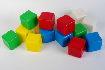 Colored plastic cubes for children's play on a light.