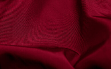 czerwony marszczony  bawelniany material z widocznymi szczegolami. tlo