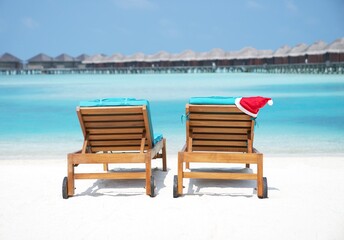 Xmas Christmas Santa Hat on Sunbed in Maldives 