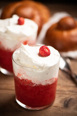 A delicious breakfast with strawberry granita and brioches, sicily