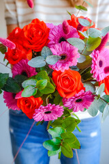 woman with bouquet of roses