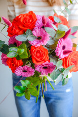 woman with bouquet of roses