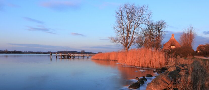 Panoramic view to devine winter landscape at the Schlei fjord and the picturesque village of Sieseby.