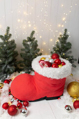 background texture. decorated with Christmas decorations for a photo shoot of newborns. furniture for dolls. Christmas balls toys