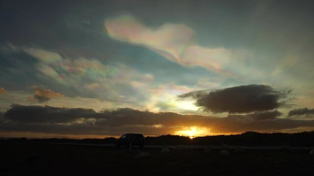 Nacreous polar stratospheric clouds swans sunset traffic