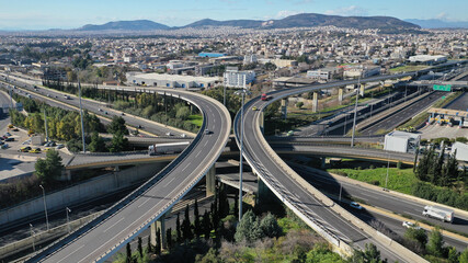 Aerial drone photo of multilevel junction national road crossing urban Metropolitan area
