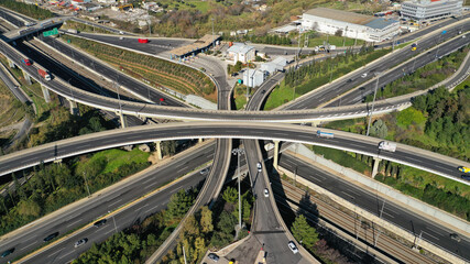 Aerial drone photo of multilevel junction national road crossing urban Metropolitan area