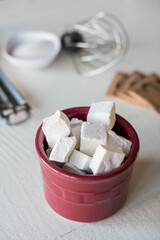 Fototapeta na wymiar homemade marshmallows with cooking utensils