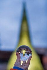 glass tree behind glass ball