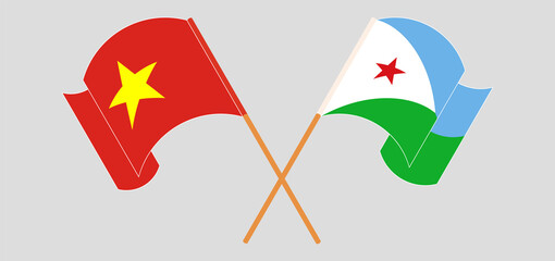 Crossed and waving flags of Vietnam and Djibouti