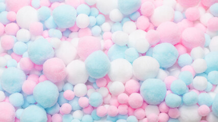 White, pink and blue soft pompons.